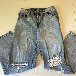 These are ripped blue jeans from sincerely Jules, size 3/26